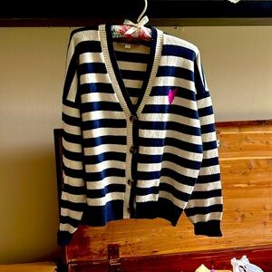 Super soft navy and cream colored cardigan with a cute pink heart